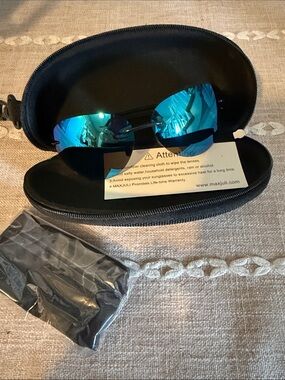 Brand new in case Max Juli Blue Mirrored Lens Sunglasses with Hard Case.